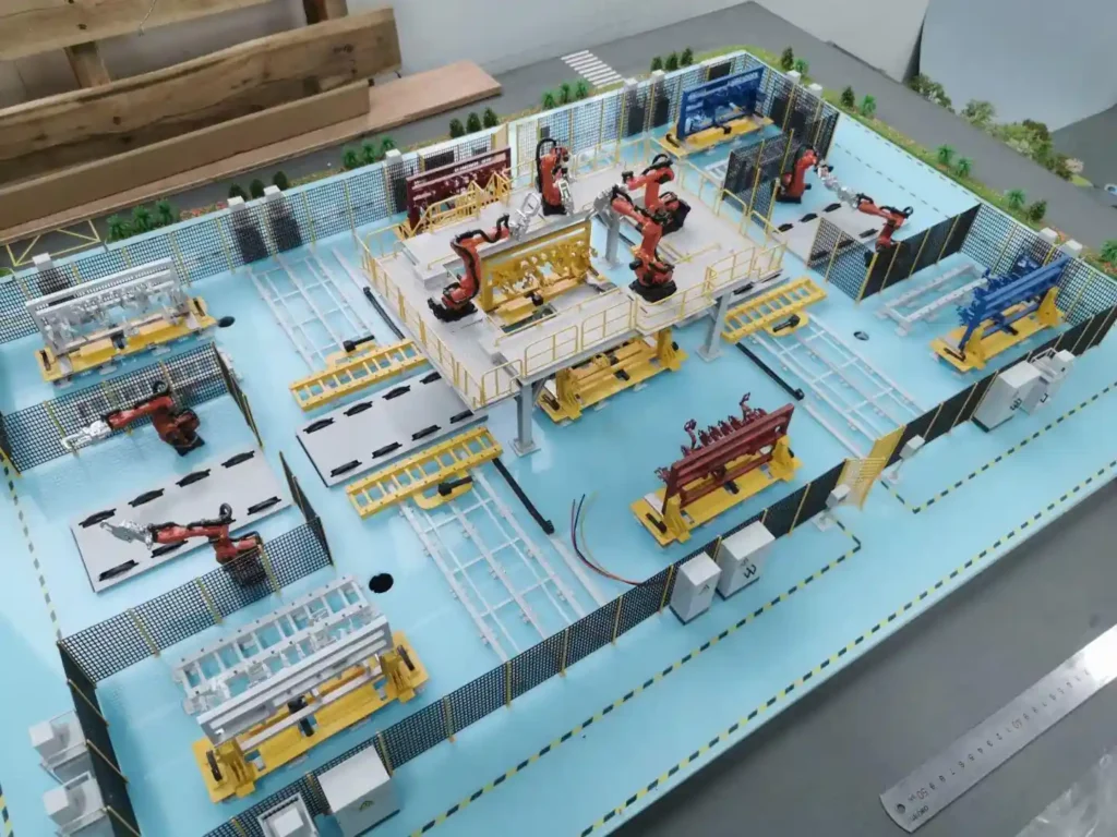Custom scale model of industrial factory production line with robotic workstation