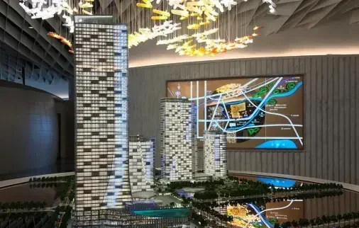 Architectural scale building exterior model showing facade material and massing for real estate marketing presentation